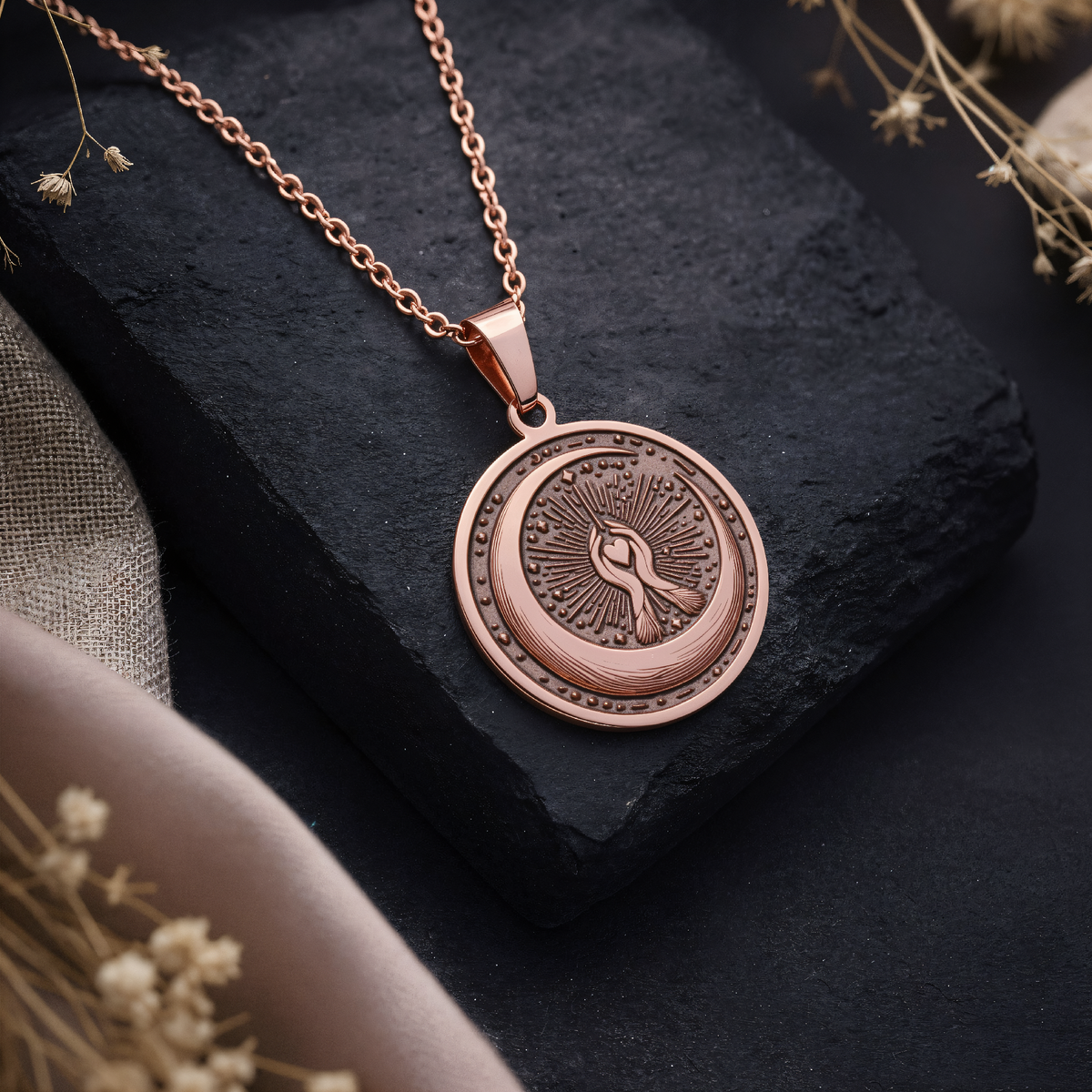 Crescent Moon Celestial Pendant in a polished rose gold finish.