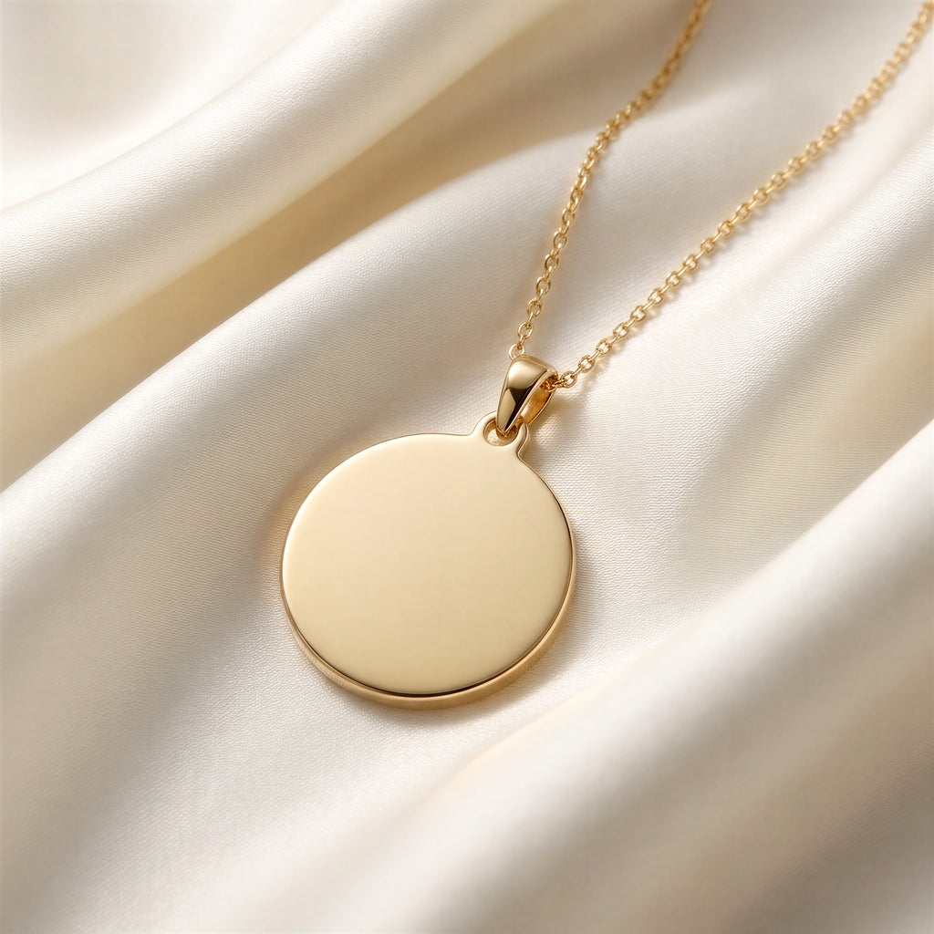 Custom Engravable Blank Coin Pendant - 14K Gold Plated Editorial Close-Up on Ivory Mulberry Silk