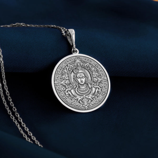 Lord Shiva Pendant in Gold and silver, symbol of divine transformation and protection, intricately handmade, available in gold, silver, and rose gold. Ideal spiritual gift for meditation and enlightenment.