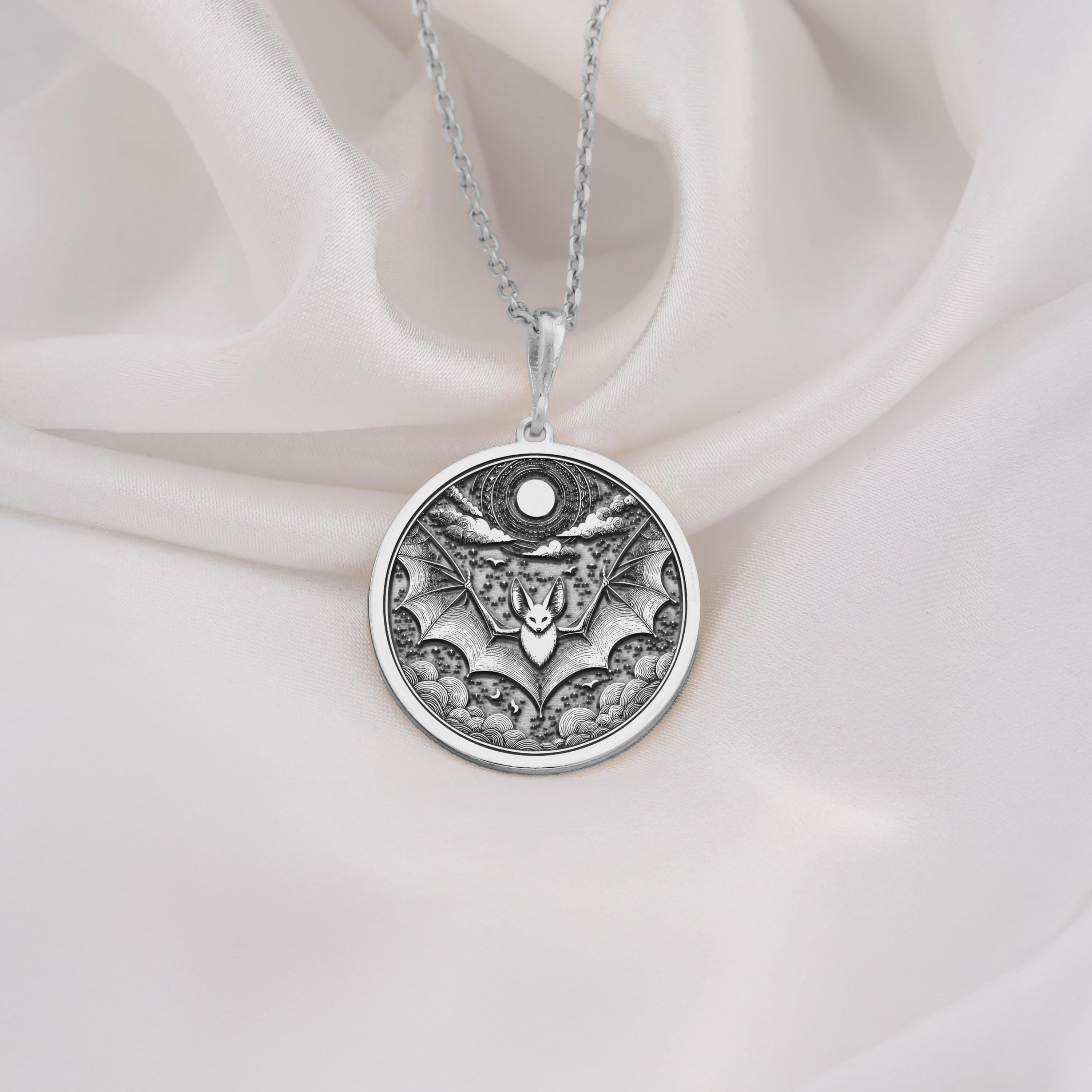 925 Sterling Silver Bat Pendant. Intricate 925 sterling silver bat pendant with a moon motif, ideal for unisex gothic jewelry and night inspired accessories.