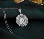 Sterling Silver Samoyed Angel Pendant with detailed memorial design. Handcrafted silver coin charm featuring beloved fluffy arctic breed with wings, halo and ornate elements. Rainbow bridge jewelry celebrating eternal bond with Samoyed companions.