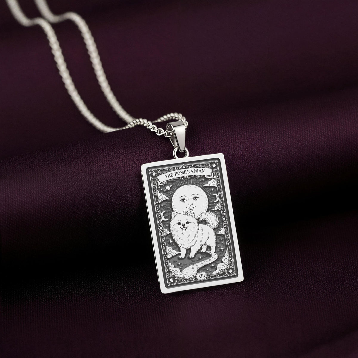 A striking 925 sterling silver Pomeranian charm. The art shows the celestial "Pom," a meaningful piece of jewelry for a pet owner.