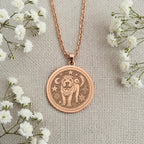 Celestial Moon & Star Shar Pei Medallion Pendants 14K Rose 14K 14K Rose Gold Plated pendant necklace featuring an embossed dog design with stars and crescent moon elements.