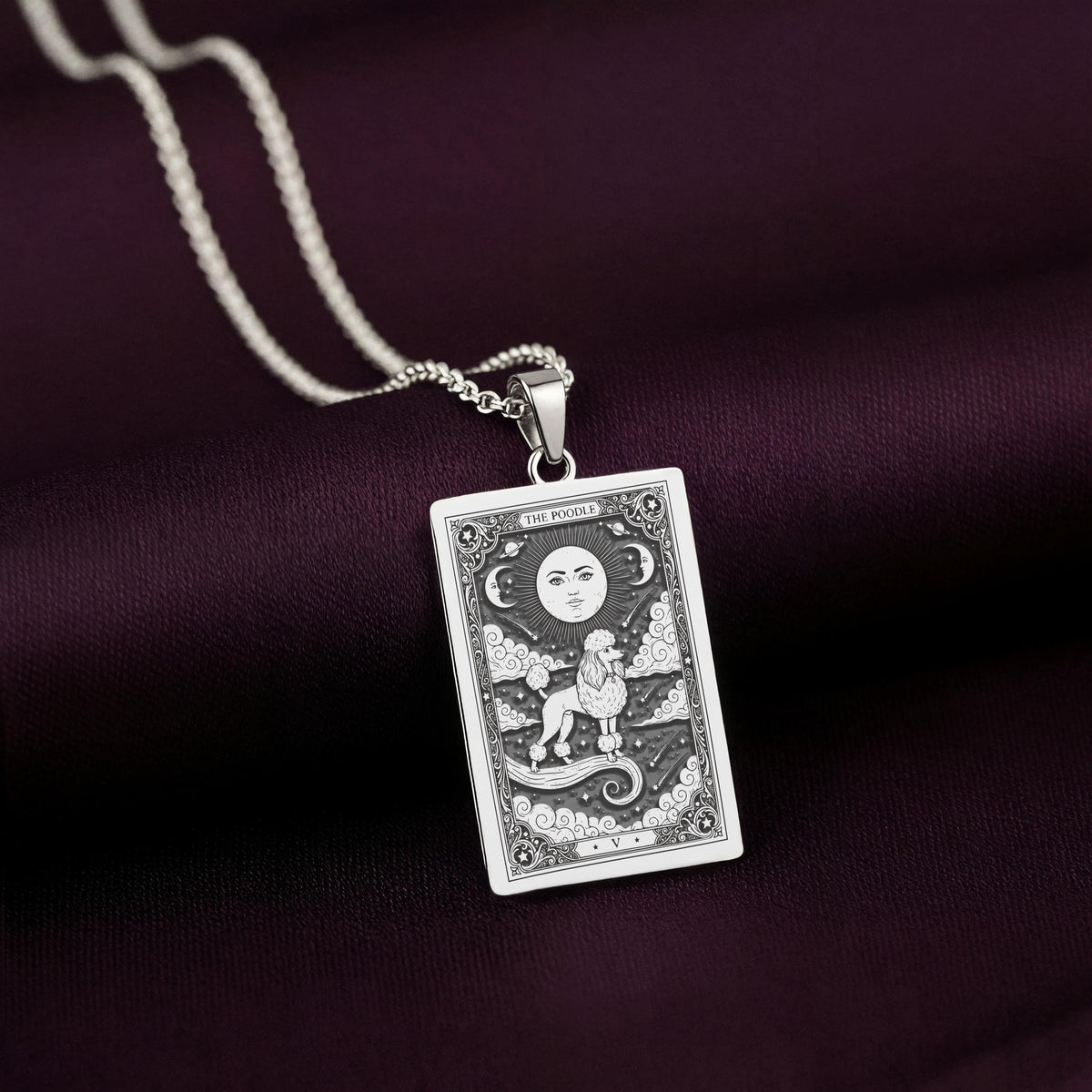 A striking 925 sterling silver Poodle charm. The art shows the celestial dog, a meaningful piece of jewelry for a pet owner.