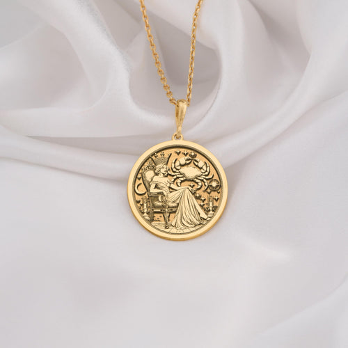 Cancer Zodiac Queen Medallion Pendants 14K 14K Gold Plated round pendant with an ornate classical scene design on a gold chain.