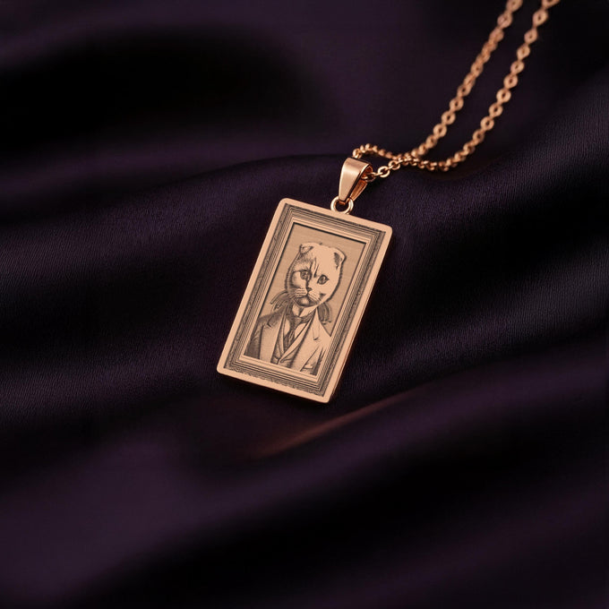 A Rose Gold Plated Scottish Fold necklace, displaying its warm, pinkish hue. The engraved art features a cat with distinctive folded ears and a gentleman's suit.