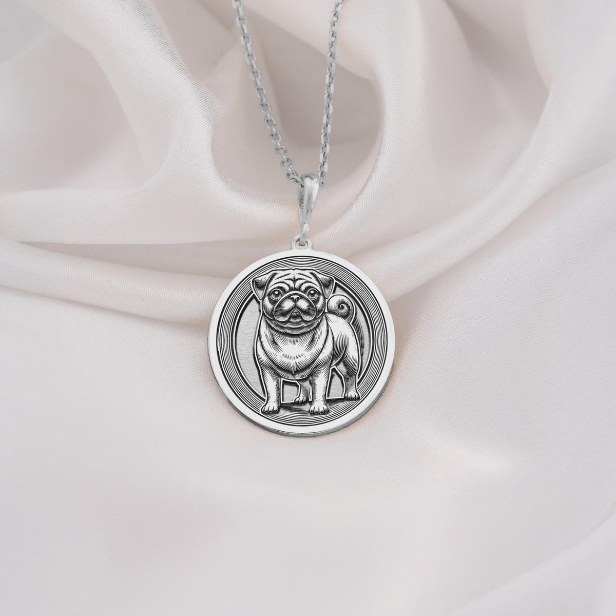 Intricately detailed 925 Sterling Silver Pug pendant, designed with a classic dog silhouette. A perfect silver pet charm, symbolizing devotion and companionship, making it a wonderful gift for Pug owners.