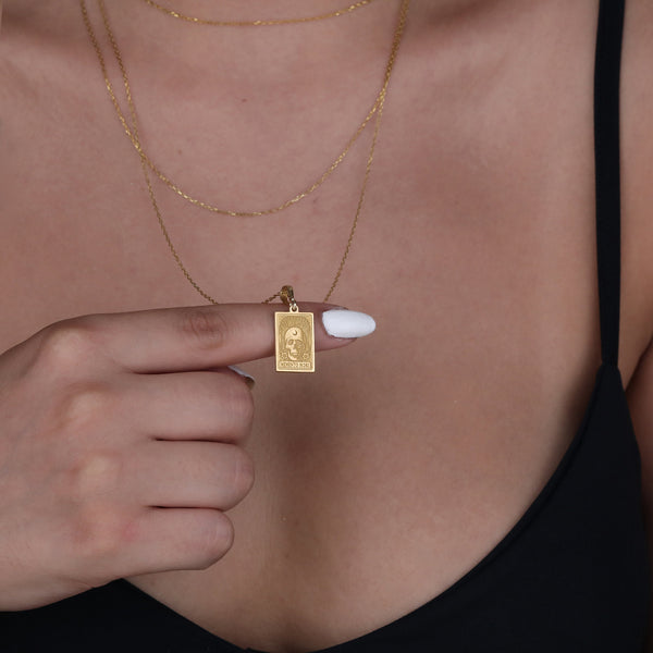 Real gold Memento Mori skull charm pendant, vintage-inspired, meaningful necklace, resilience symbol, lightweight and stackable, boho style, perfect for layering, crafted for everyday wear, one-of-a-kind, meaningful gift.