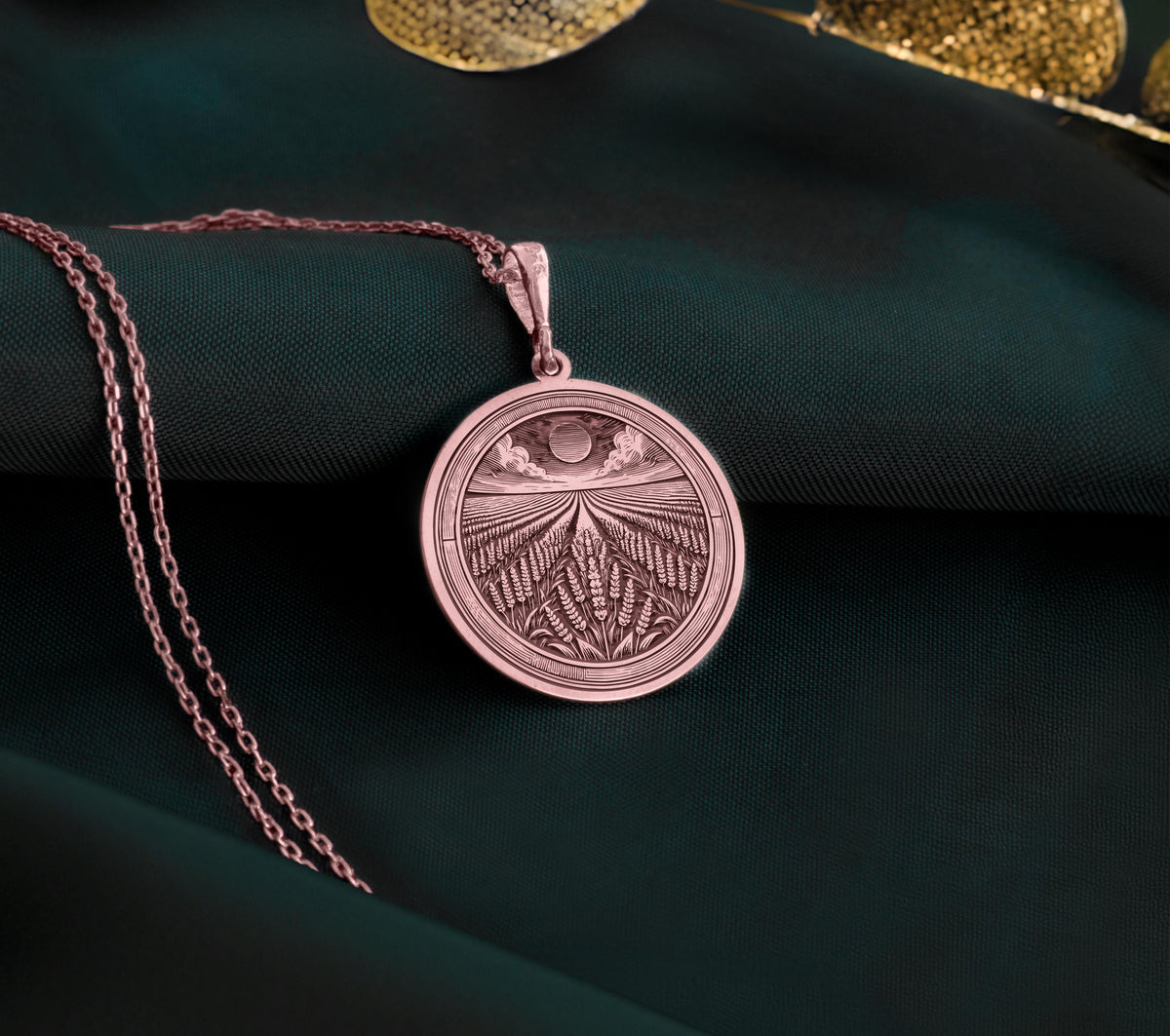 Lavender Field Floral Sun Coin Pendant Necklaces 14K Rose 14K 14K Rose Gold Plated metal crescent moon sunburst pendant necklace on dark fabric.
