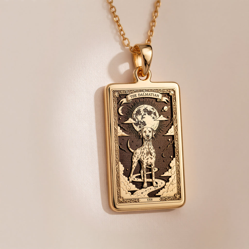 An heirloom-quality 14K solid gold Dalmatian tarot pendant. The art shows the spotted dog under the moon, symbolizing loyalty, a precious dog mom gift.