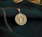 14K Gold Plated Beagle Angel Dog Medallion with memorial symbolism. Detailed hound breed angel pendant with wings, halo and radiant elements. Elegant rainbow bridge jewelry gift representing eternal bond with departed beloved Beagle companion.