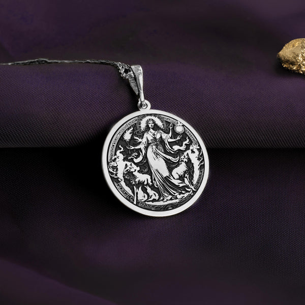 Silver Hecate charm pendant showcasing the triple moon goddess, a sacred symbol of magic, transformation, and divine intuition. Crafted for spiritual seekers, witches, and those drawn to lunar energy, this amulet embodies protection and inner wisdom. Rooted in ancient mythology, it represents the crossroads, the phases of the moon, and the cycle of life. A perfect gift for Wiccans, pagans, and those embracing goddess energy, spirituality, and mystical knowledge in their daily rituals.