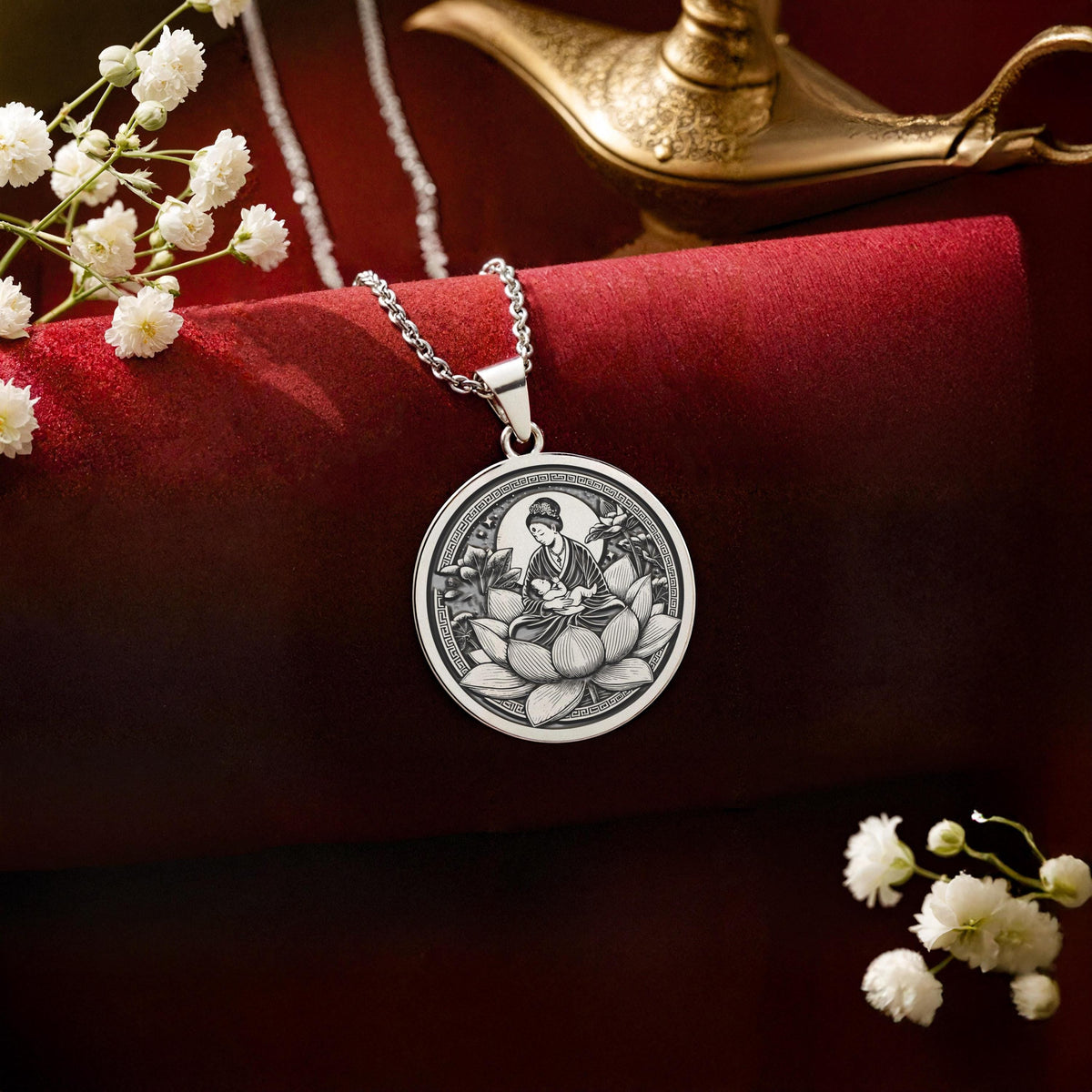 A striking 925 sterling silver Mother and Child charm. The art shows the mother and baby on a lotus, a meaningful piece of jewelry for a new mother.