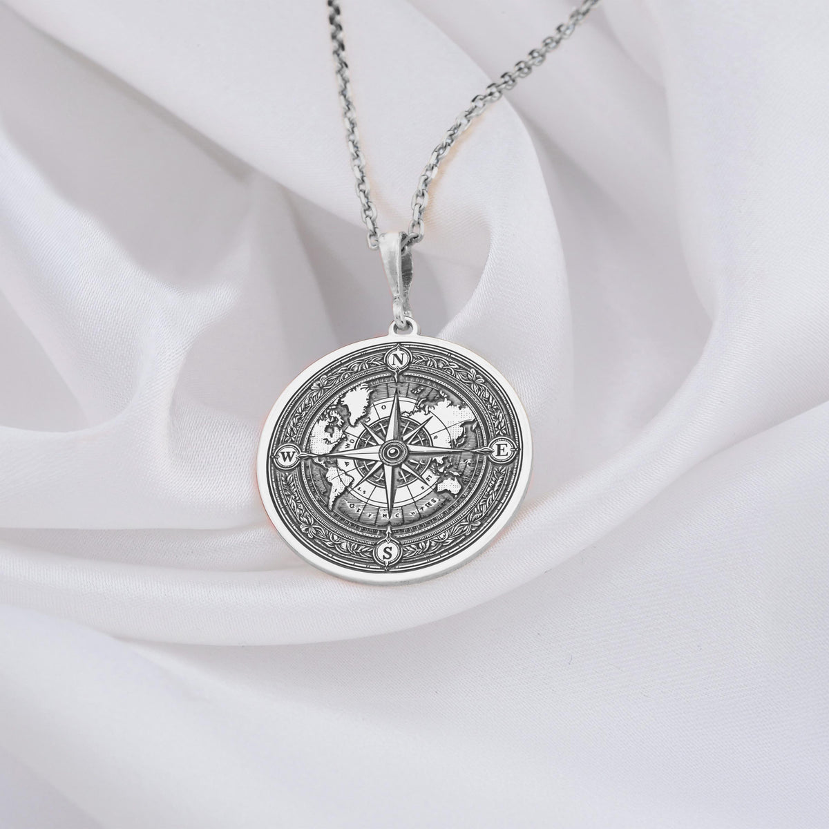 Round Silver Compass Pendant, a perfect symbol of direction and adventure. This elegant Silver Compass Necklace makes a thoughtful gift, representing guidance and purpose.