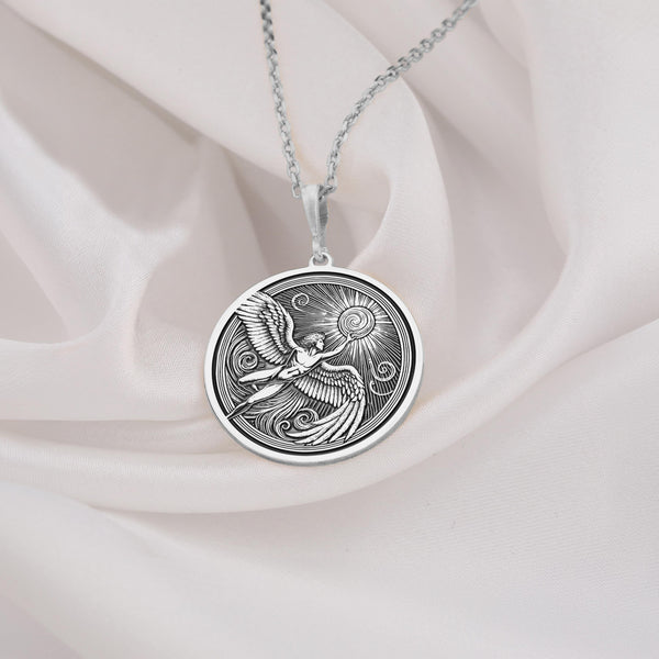 Intricately detailed 925 Sterling Silver Icarus medallion, designed with a celestial sun and winged figure. A perfect silver mythology charm, representing resilience and ambition.