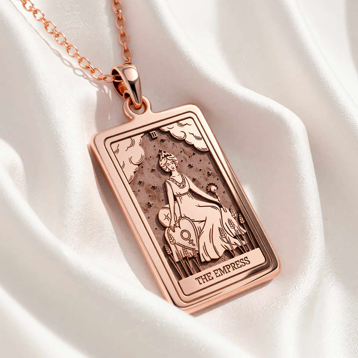 Empress Tarot Necklace rose gold plated rectangular pendant featuring the seated Empress figure with wheat and stars.