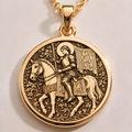 Equestrian Saint Joan of Arc Pendant in a gold finish, shown from the front with detailed engraving on the pendant.