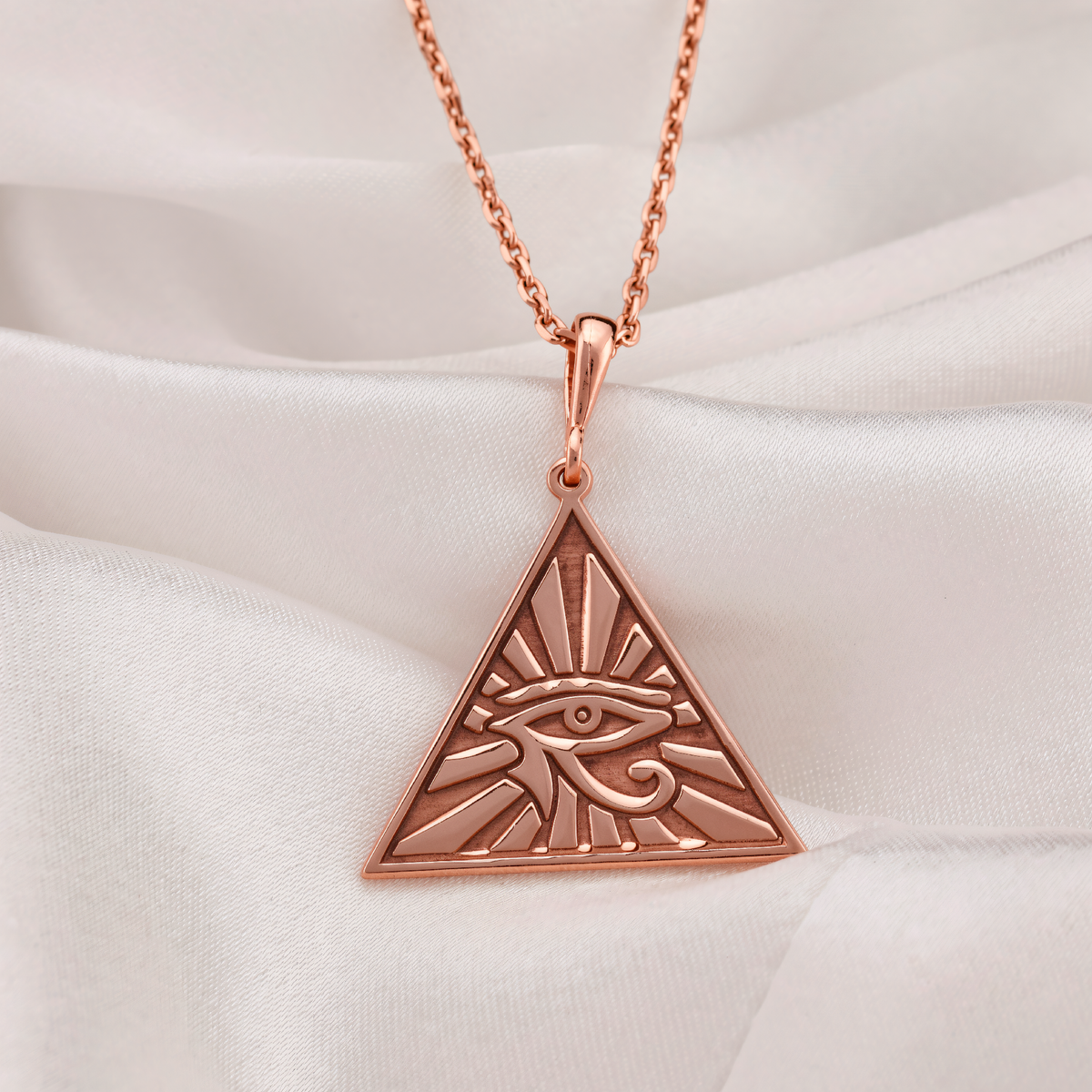 Eye of Horus Protection Talisman Pendant in a polished rose gold finish.