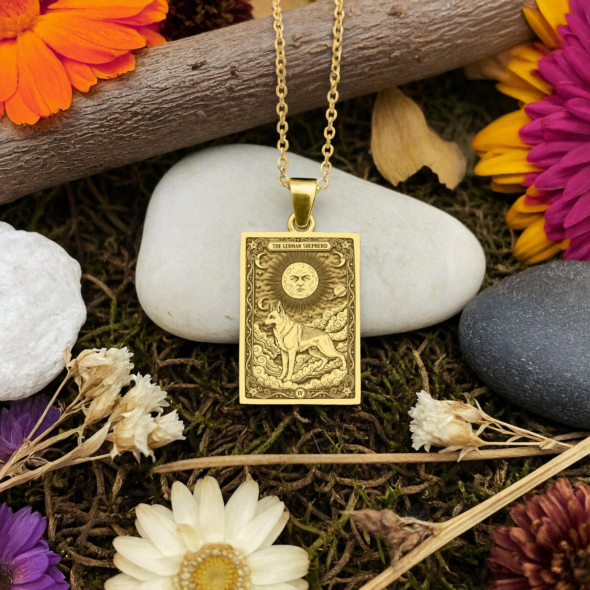 A handmade 14K gold plated German Shepherd necklace. The engraving captures the loyal guardian in a "Sun" tarot card style.