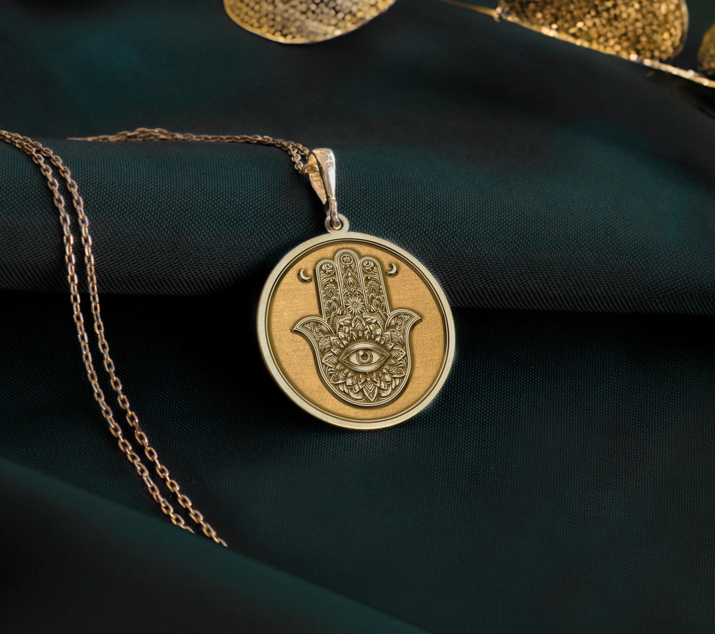 14K Gold Plated Hamsa necklace with ornate evil eye design, offering both beauty and protective symbolism. Great gift for her, perfect for daily wear or spiritual occasions.