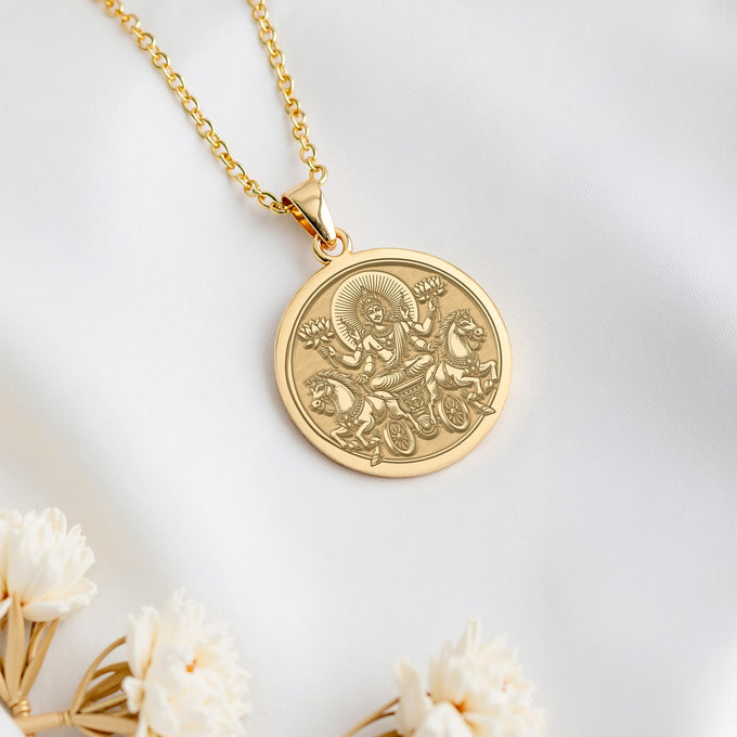 Refined gold-plated Surya sun pendant for radiant spirits, evoking celestial aura with elegance – buy this Vedic revival amulet today.