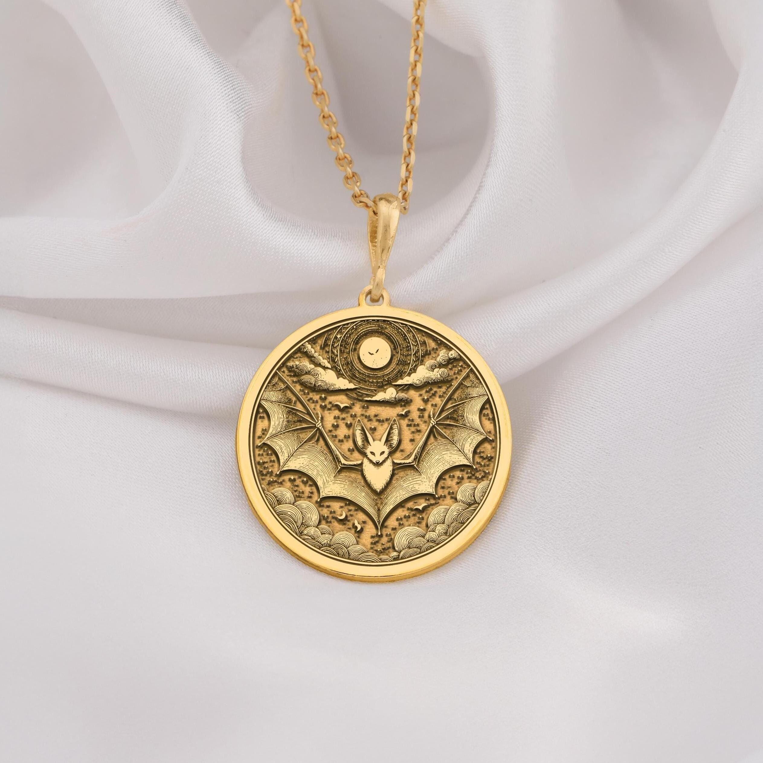 14K Solid Gold Bat Necklace . A luxurious 14K solid gold bat pendant, featuring a celestial design with a moon and bat, perfect for gothic jewelry lovers and nature enthusiasts.