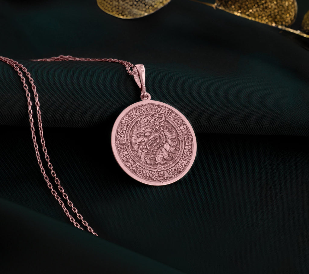a necklace with a picture of a woman on it