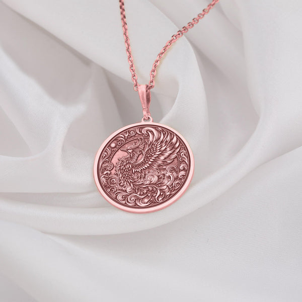 Rose Gold-Plated Phoenix with Golden Plume – This rose-plated phoenix necklace exudes enchanted feathers and opulent wingspan. An evocative symbol of rebirth, perfect for those who love mystical jewelry.