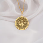 Hestia Goddess Hearth Pendant Necklaces 14K 14K Gold Plated round pendant featuring a draped winged female figure design.