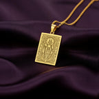 A rectangular 14K gold plated tarot card necklace featuring the Egyptian Cat Goddess, Bastet. This divine feline piece is a powerful protector of the home.