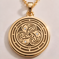 Flower of Life Sacred Geometry Pendant in 14K solid gold featuring concentric rings and a central swirling motif.