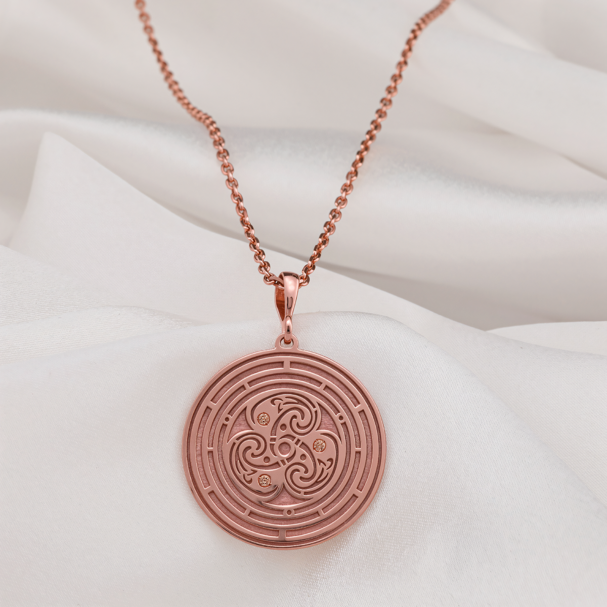 Flower of Life Sacred Geometry Pendant in a polished rose gold finish.