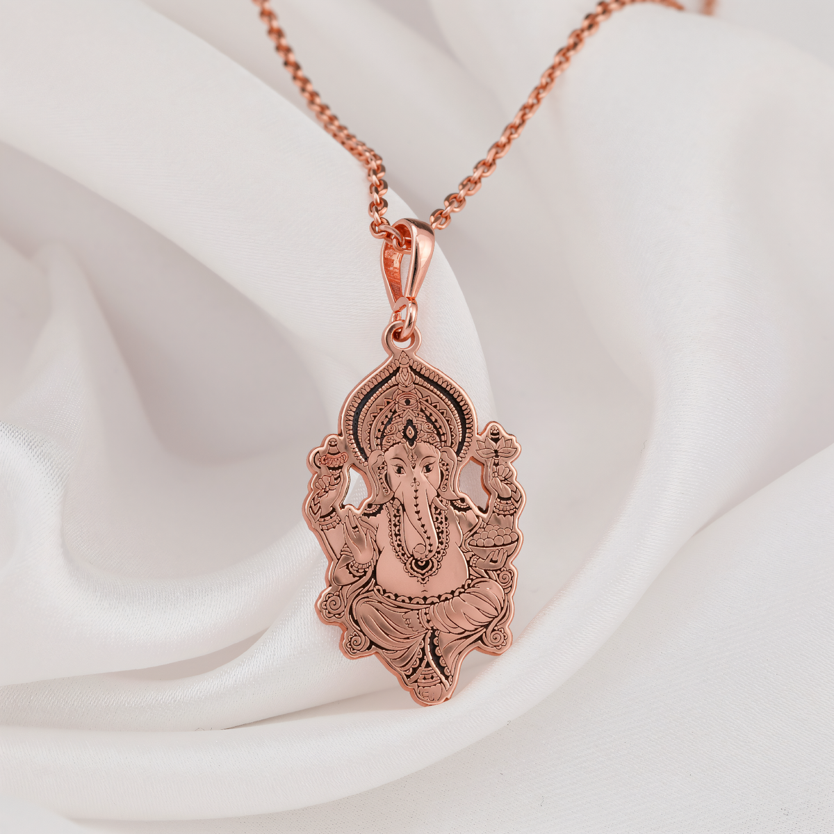 Ganesha Elephant God Amulet Necklace in a polished rose gold finish.