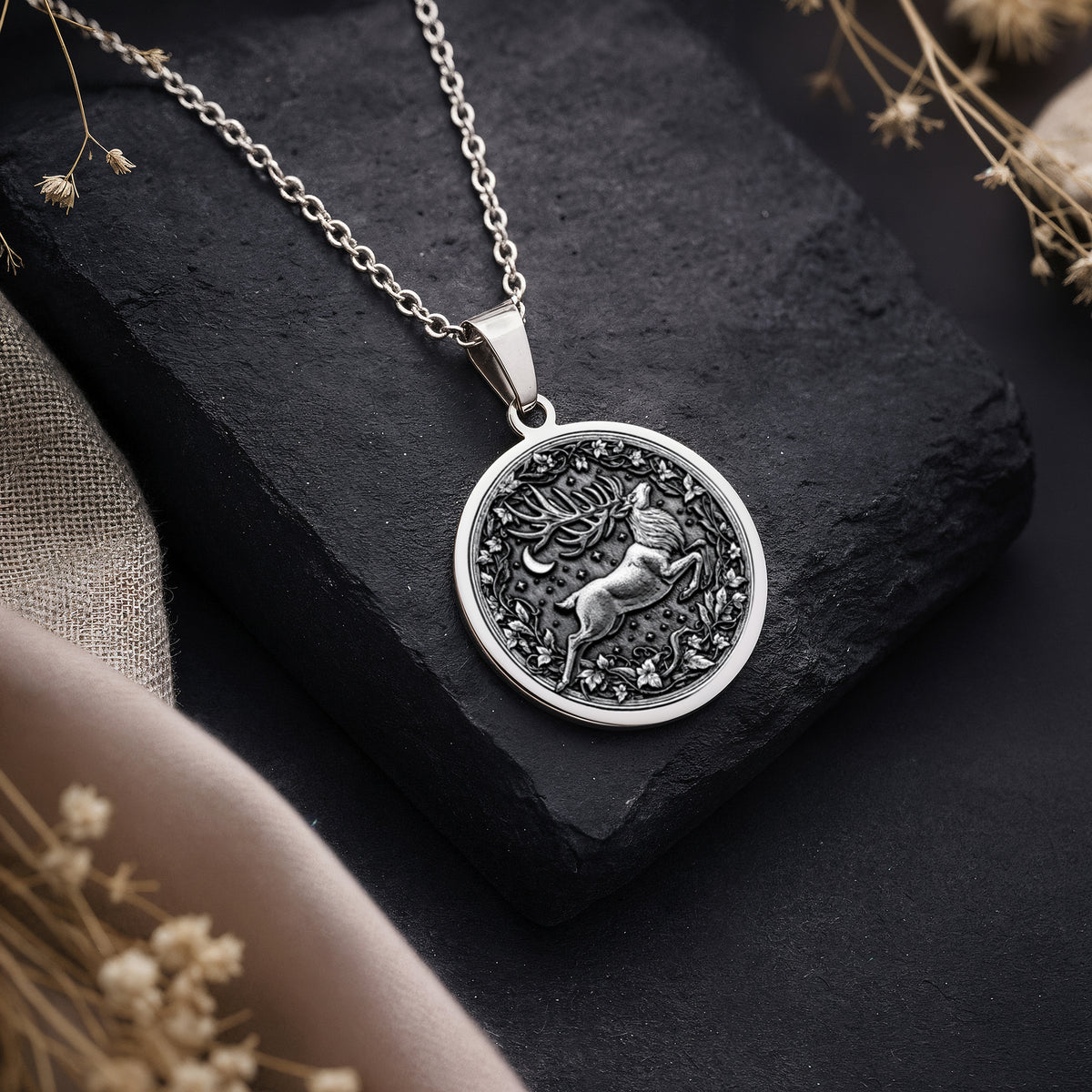 Sterling silver Stag Deer Head Necklace: round  detailed relief engraving of a stag lea...