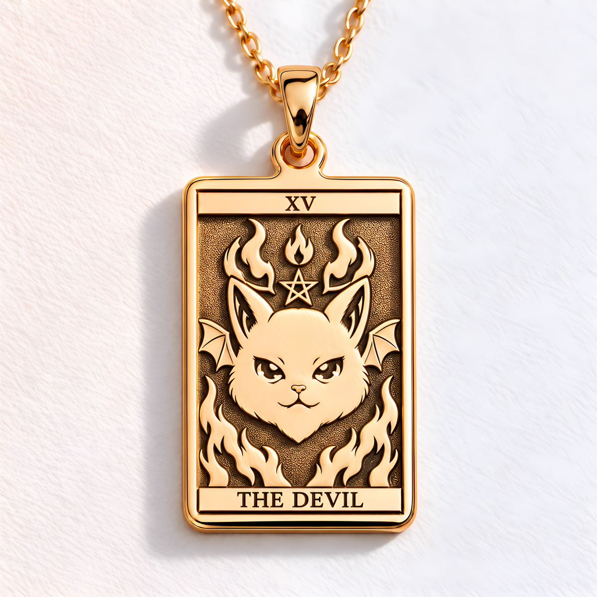 Horned Devil Cat Pendant in a gold finish, shown from the front with detailed engraving on the pendant.