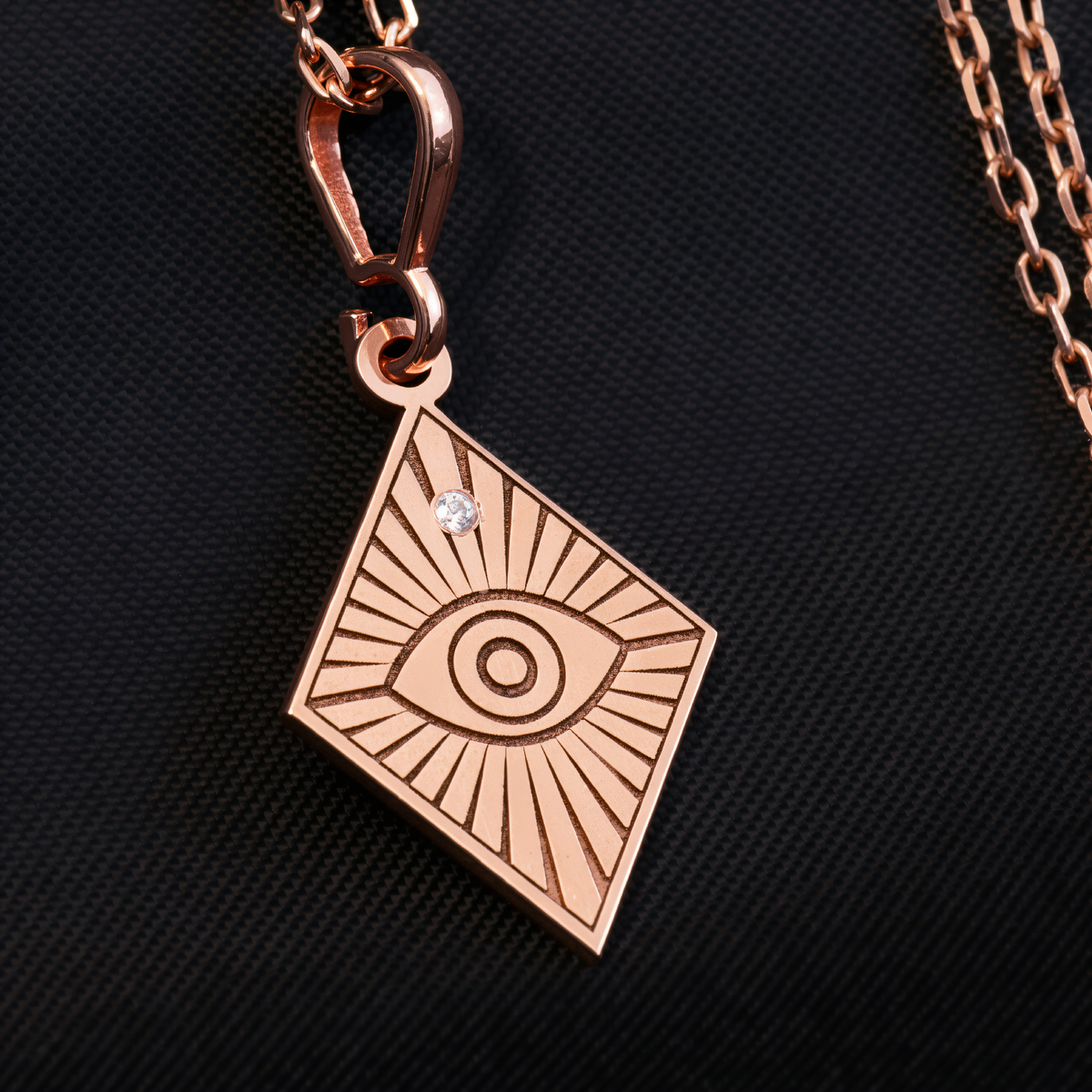 Horus Eye Diamond Talisman Necklace in a polished rose gold finish.