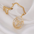 Phoenix Rising Necklace: 14K solid gold pendant with a phoenix rising from flames in an open circle design.