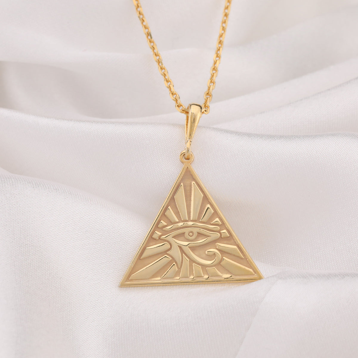 Eye of Horus Protection Talisman Pendant Necklaces 14K 14K Gold Plated pendant necklace featuring an evil eye design in a triangular sunburst shape.