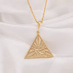 Eye of Horus Protection Talisman Pendant Necklaces 14K 14K Gold Plated pendant necklace featuring an evil eye design in a triangular sunburst shape.