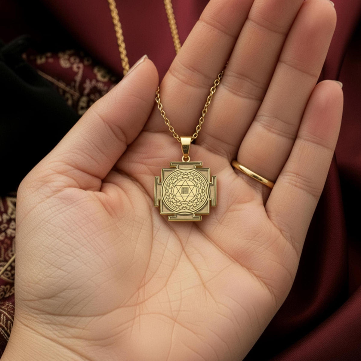 Kuber Yantra Sacred Geometry Prosperity Pendant — 14K Gold Plated worn on model neckline close-up