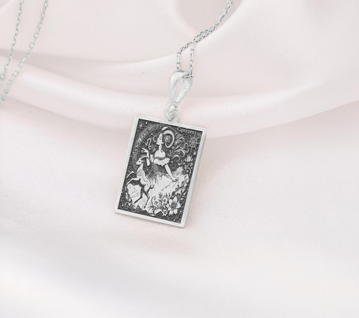 Capricorn Zodiac Astrological Pendant Pendants 925 925 Sterling Silver rectangular pendant with classical scene design on a chain.