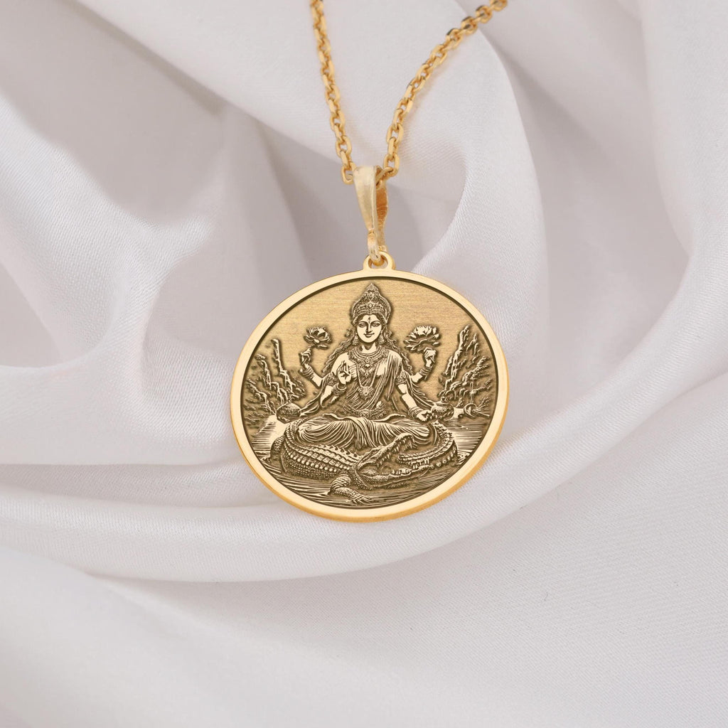 Ganga Goddess Pendant Necklace Necklaces 14K 14K Gold Plated pendant necklace featuring a seated deity and snake design on a round disc.