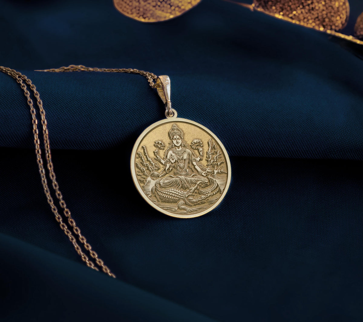 Ganga Goddess Pendant Necklace Necklaces 14K 14K Gold Plated plated round pendant with seated spiritual figure design on a gold chain.