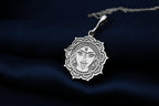 Durga Warrior Goddess Amulet Necklace Necklaces 925 925 Sterling Silver metal pendant with a stylized face in a circular mandala frame necklace