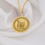 Meditating Buddha Necklace Necklaces 14K 14K Gold Plated round pendant necklace featuring a seated figure design.