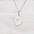 Silver pendant shaped like an Ace of Hearts playing card, featuring a heart cut-out in the middle and an 'A' in the top left and bottom right corners.