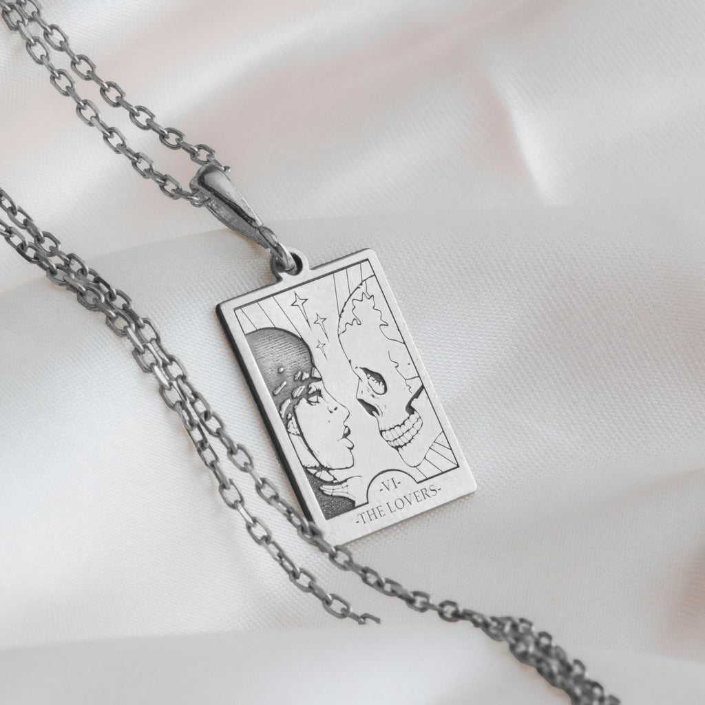 Lovers Tarot Card Necklace Necklaces 925 925 Sterling Silver rectangular pendant necklace featuring two facing skulls.