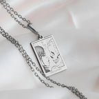 Lovers Tarot Card Necklace Necklaces 925 925 Sterling Silver rectangular pendant necklace featuring two facing skulls.
