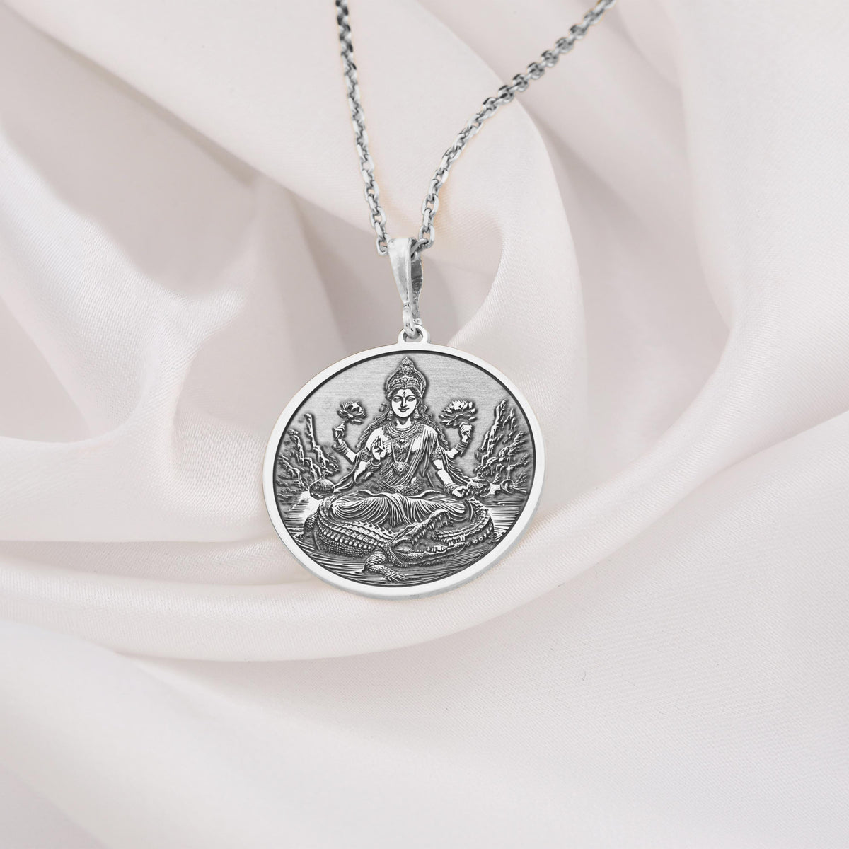 Ganga Goddess Pendant Necklace Necklaces 925 925 Sterling Silver metal pendant featuring a seated spiritual figure design on a round disc.