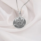 Ganga Goddess Pendant Necklace Necklaces 925 925 Sterling Silver metal pendant featuring a seated spiritual figure design on a round disc.